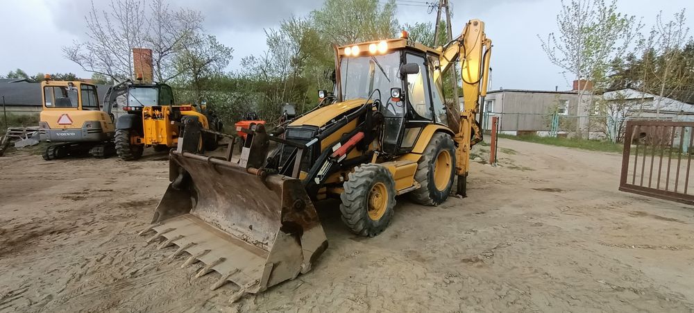 koparko ładowarka CAT 428c widły teleskop krokodyl 4x4 manual