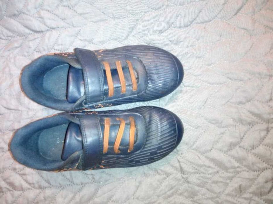 Футбольне взуття дитяче