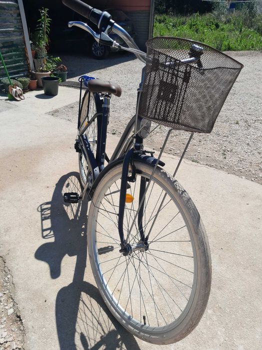 Vendo bicicleta com mudanças automáticas em bom estado quase nova