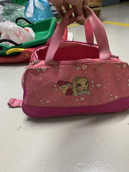 Patins + proteções + saco