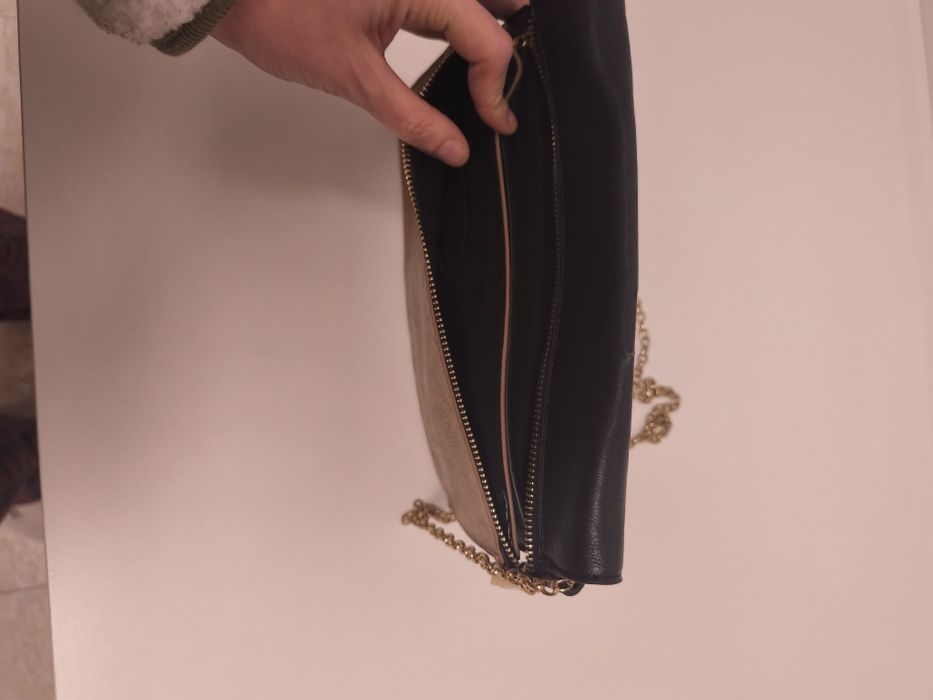 Mala tiracolo preta e bege