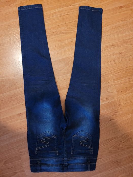 Spodnie jeansy dla dziewczynki rurki 128 yfk kik jak nowe