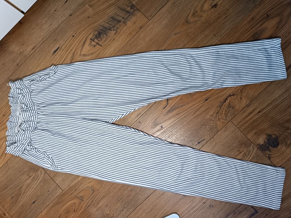 Eleganckie spodnie w paski 128 białe C&A