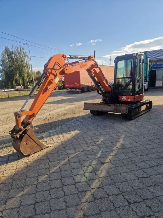 Міні-екскаватор. Послуги міні-екскаватора Мінік