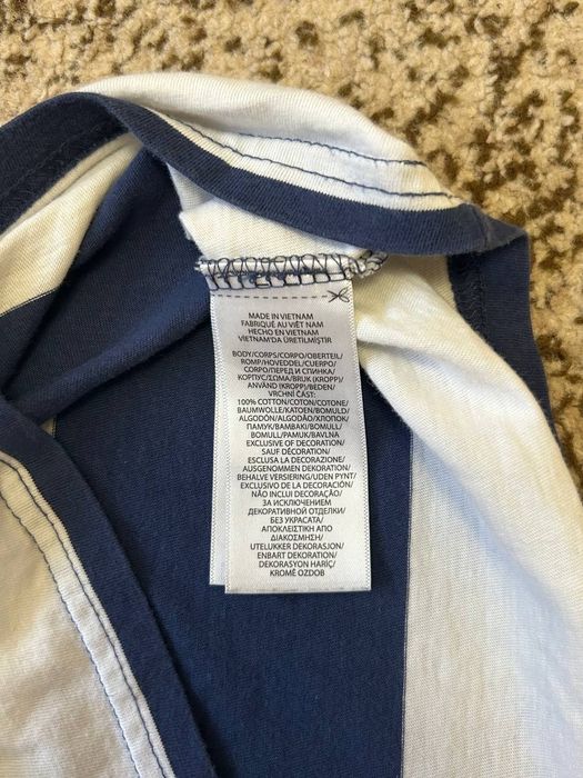 Футболка поло с розмір