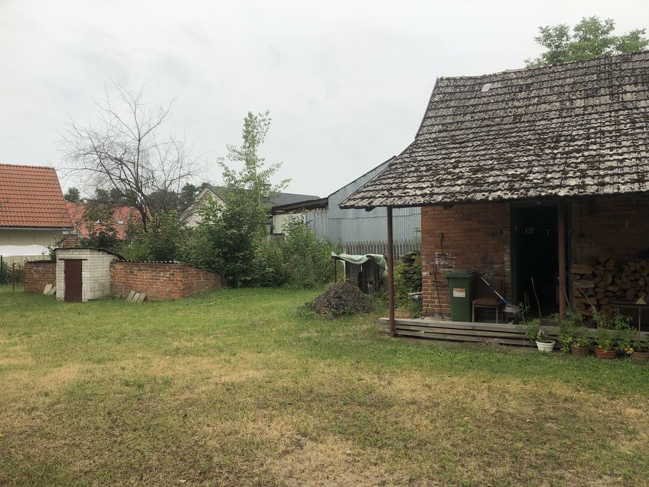 Dom z działką oraz zabudowaniami