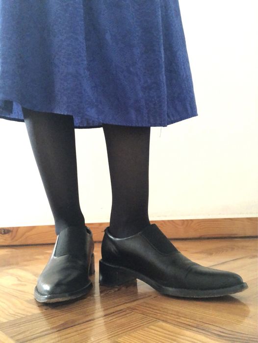 Sapatos pretos da Eureka Shoes
