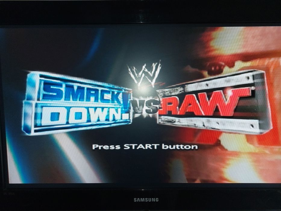 Jogo PS2 ( PlayStation 2 ) Smackdown VS RAW 2004 (Opt. Estado)
