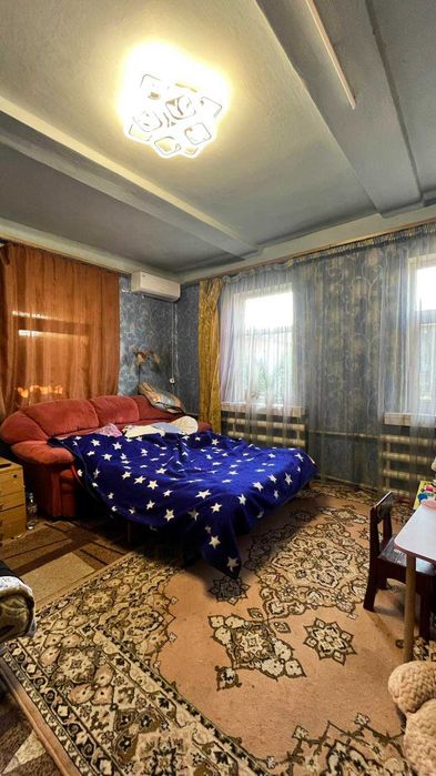 Продам 1/2 дома в районе завода Шевченко