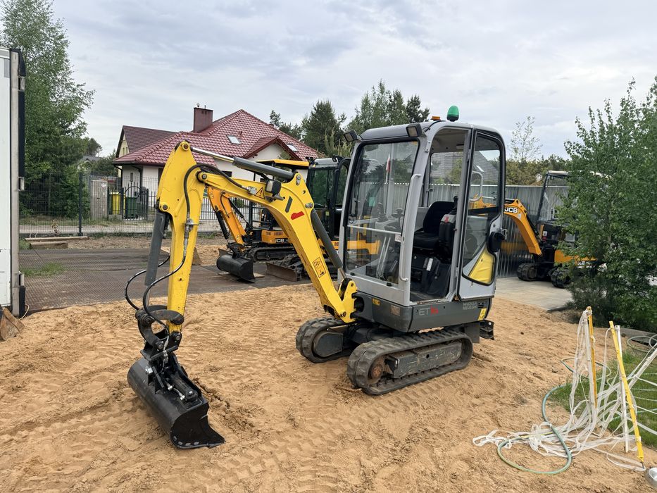 Uslugi minikoparka 1.7 t niwelacje terenu rozbiorki brukarstwo