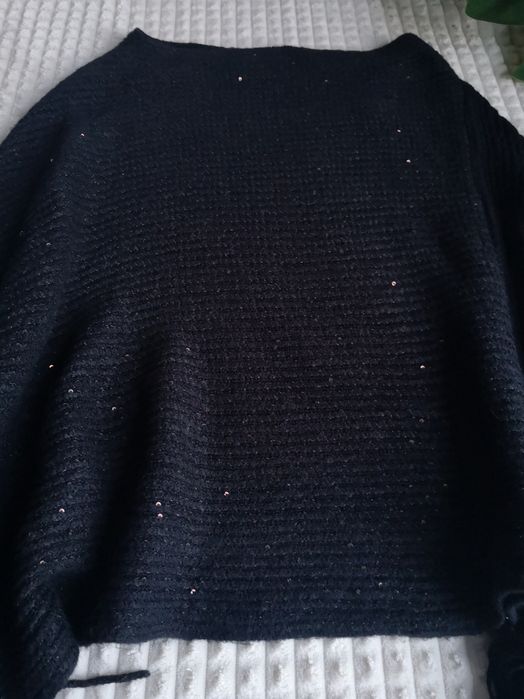 Тепла накидка пончо з китичками