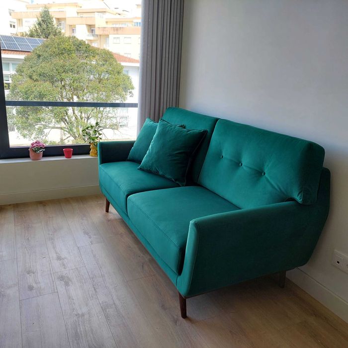 Sofá de veludo verde