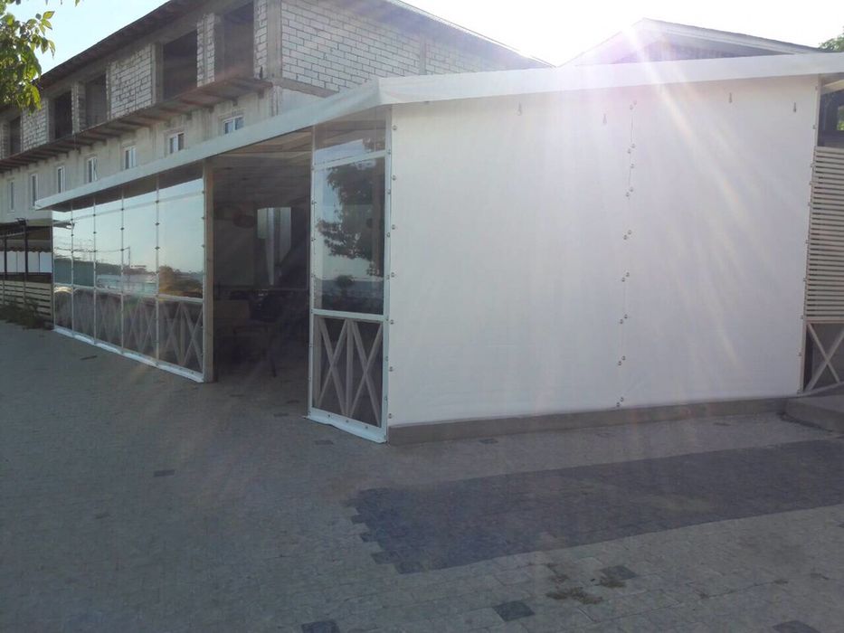 Прозрачные шторы из пленки Одесса от ветра , дождя, снега.