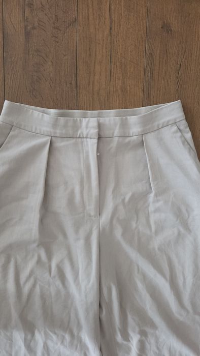 Spodnie eleganckie szeroka nogawka beżowe H&M
