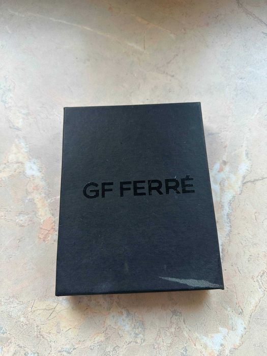 Męski portfel marki GF Ferré - wizitówka