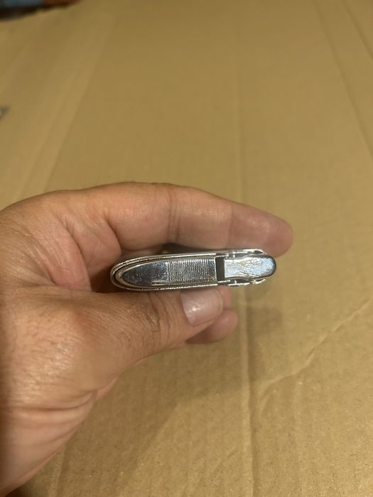Sacor isqueiro antigo metal cromado raro