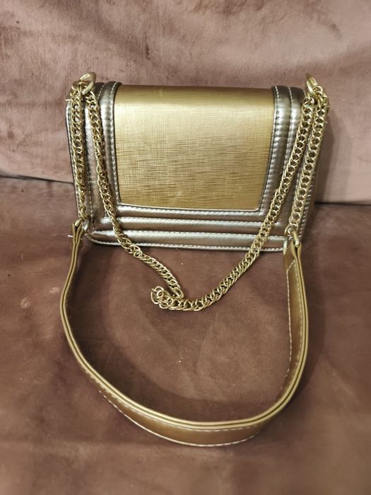 Złota imprezowa torebka