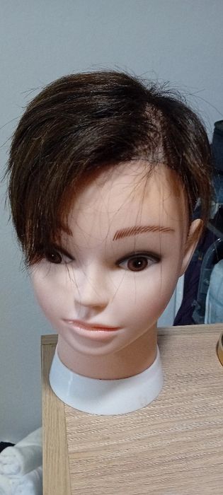 Bonecas de cabelo natural.