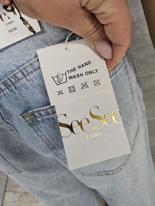 Nowe spodnie jeansowe premium SeeSee Parirs z rozdarciami rozm 40