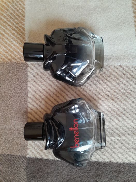 Trzy puste flakony po wodzie perfumowanej