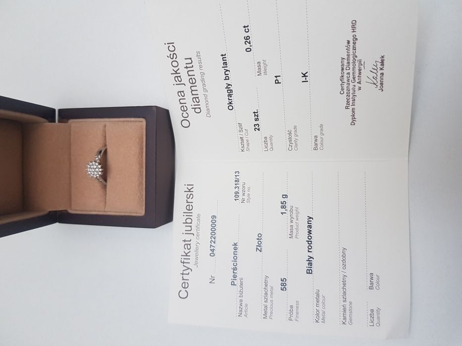 Pierścionek z białego złotą z brylantami