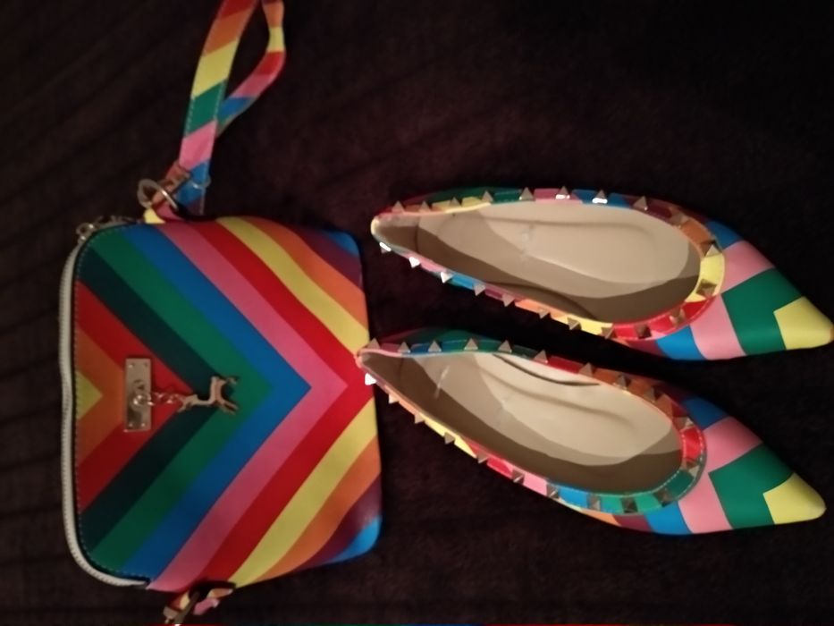 Conjunto mala Senhora e sapatos e jeans