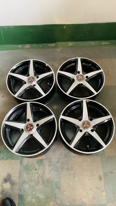 Комплект дисків R 14, міжболтове 4 х 114.3 Lacetti Mitsubishi .