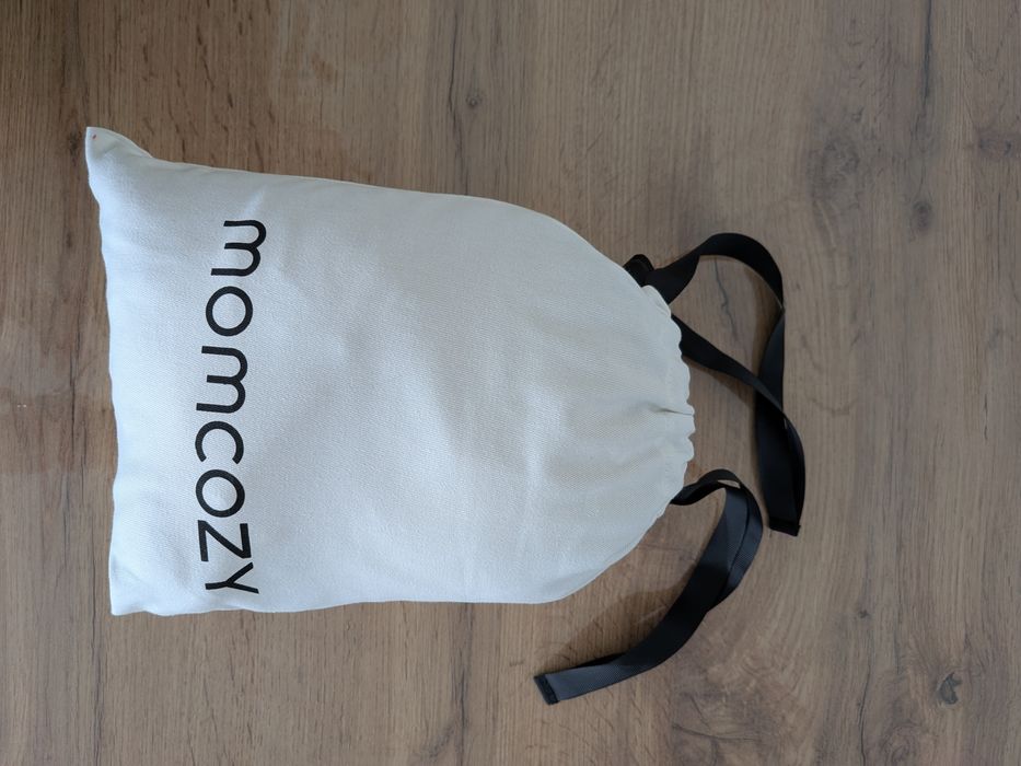 Momcozy Fular porta-bebés elástico para recém-nascidos, ajustável e ergonómico.
Canguru