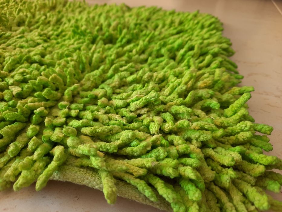 Tapete verde de cadilhos