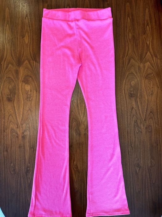 Штани кльош рожевого кольору
