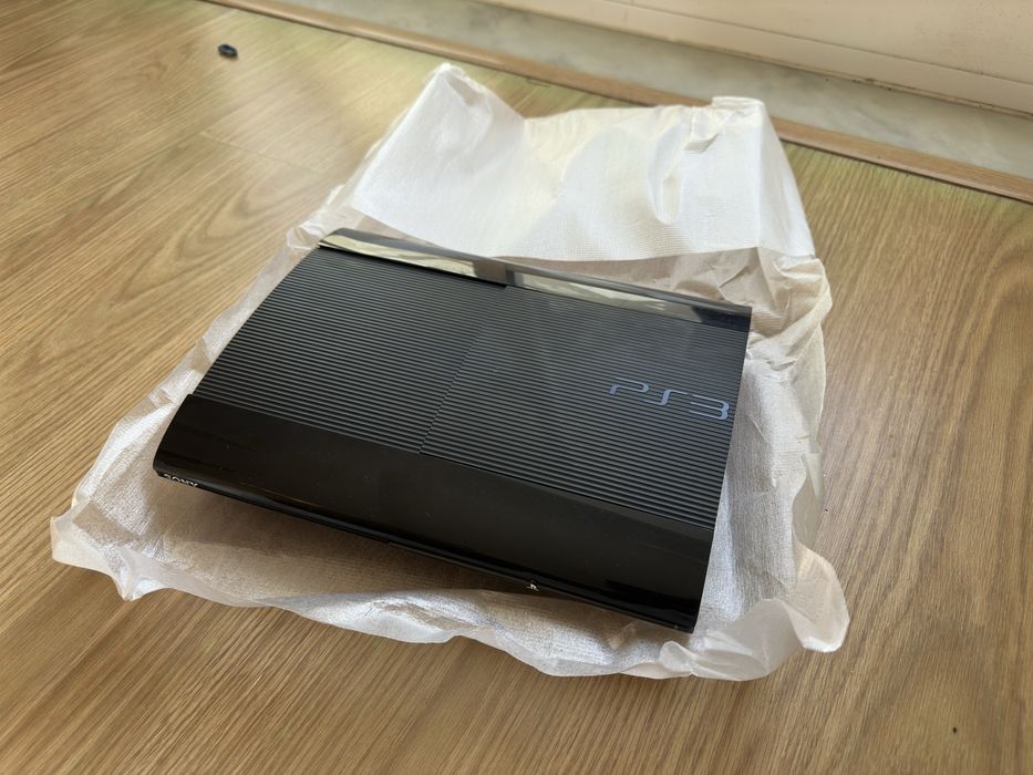 ps3 super slim - caixa the last of us com os manuais. tudo intacto