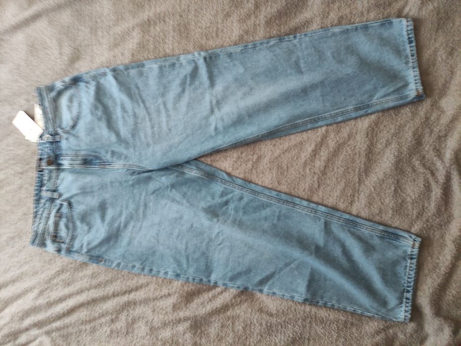 Джинси loose від бренду Cropp