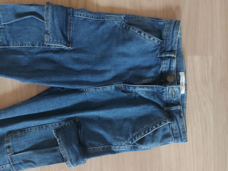 Reserved spodnie jak nowe 164