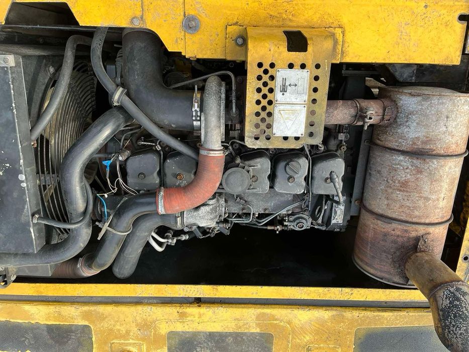 Екскаватор new holland