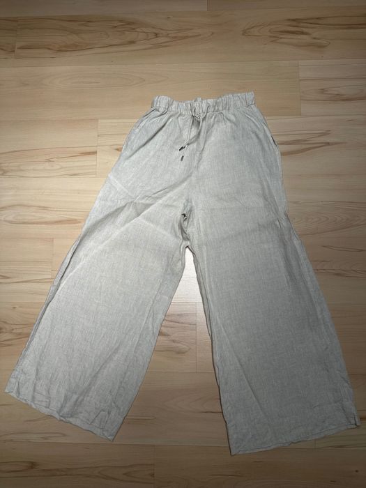 Beżowe lniane spodnie Oysho M
