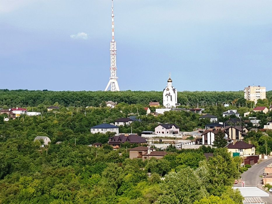 Участок  18 соток на Павловом поле пр. Науки (Ленина) за церковью