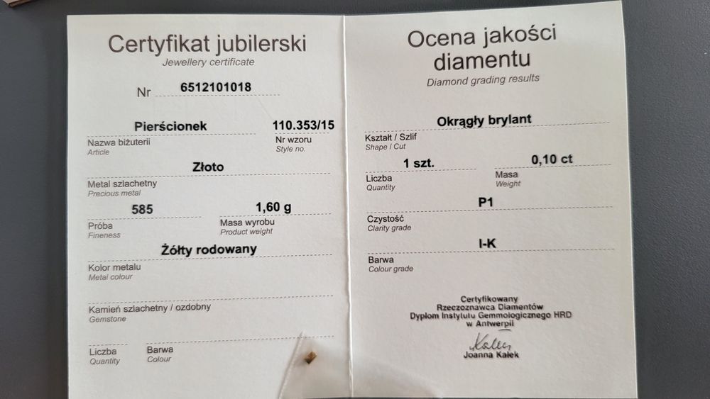 Złoty pierścionek z brylantem