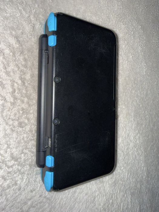 Nintendo 2DS XL + 2 gry + ładowarka