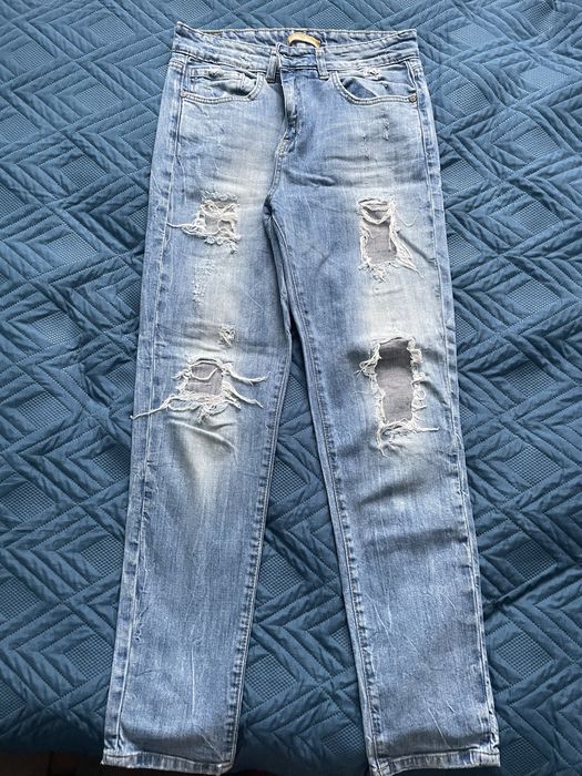Spodnie jeansowe z przetarciami