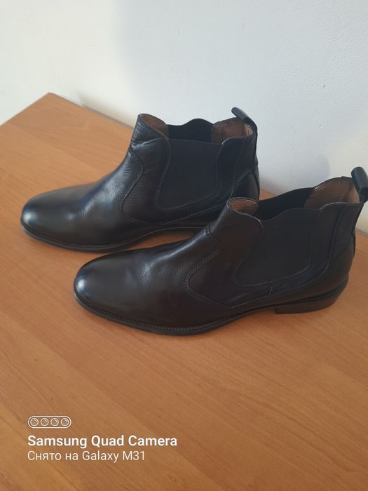 Шкіряні чоботи .