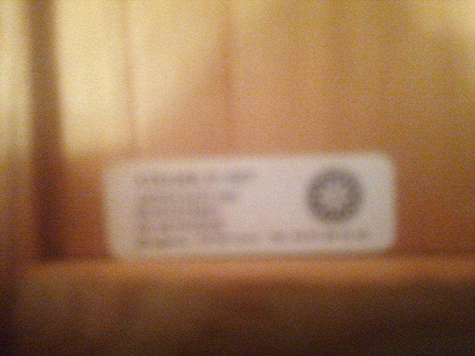 Menino Jesus em cama de madeira