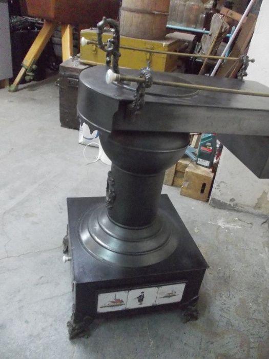 Zabytkowy piec - koza , gazowy