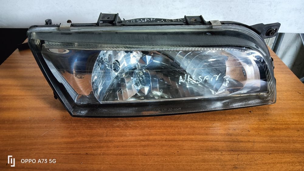 Farol Nissan Almera ótica 1998 direita