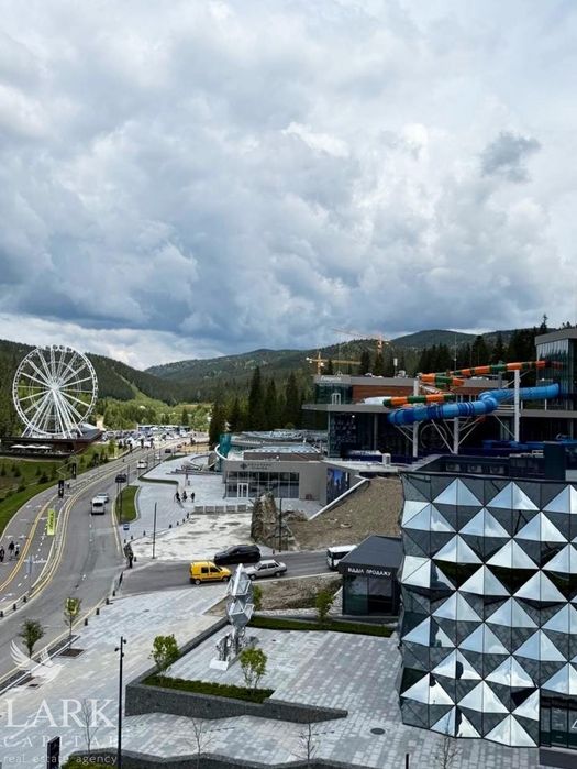 Продам апартамент в Буковелі  у  преміальному 5* готельному комплексі на озері  "Glacier premium apartments" .