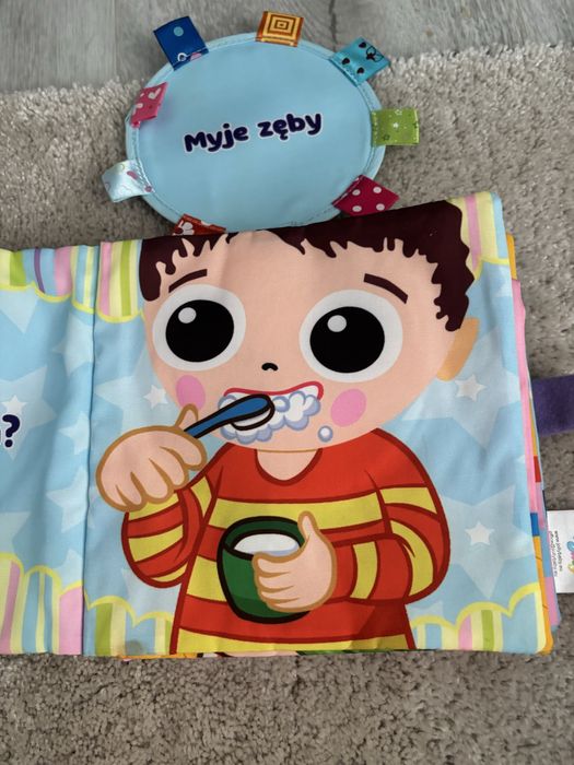 Książeczka edukacyjna sensoryczna dźwiękowa Jolly baby