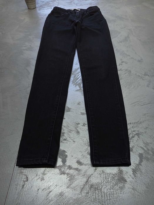 Damskie spodnie Levis W25 L30 XS