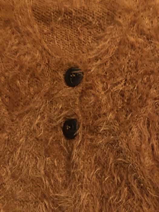 Calças largas  bolsos laterais e casaco com pelo