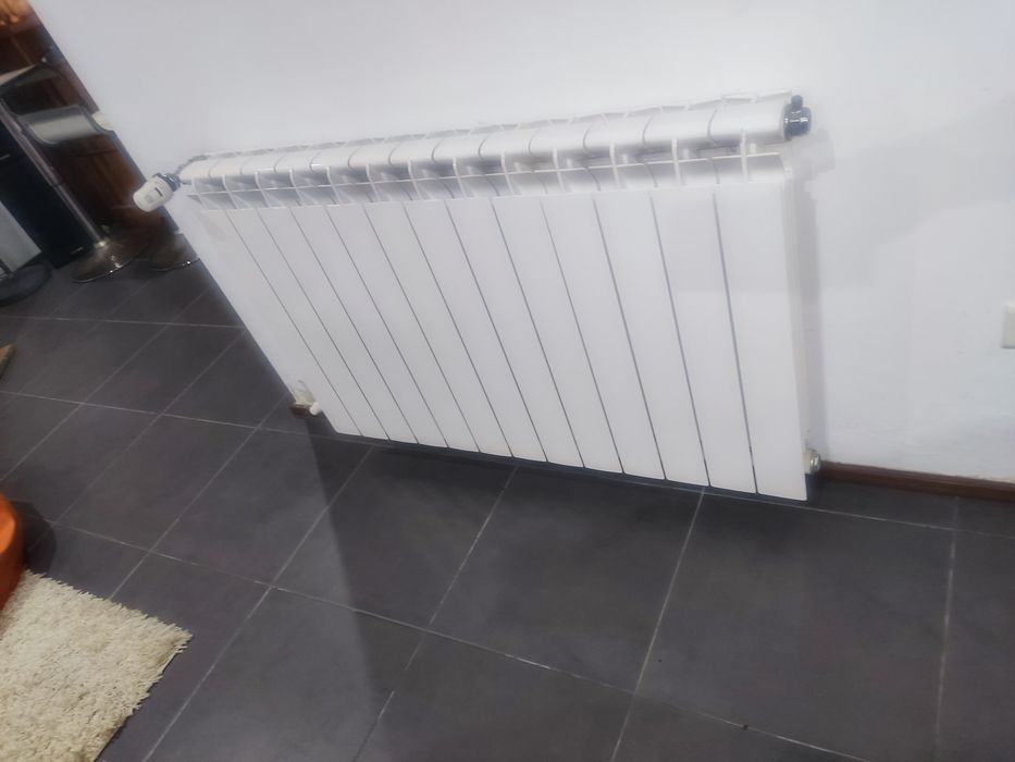 Caldeira pellets e radiadores aquecimento