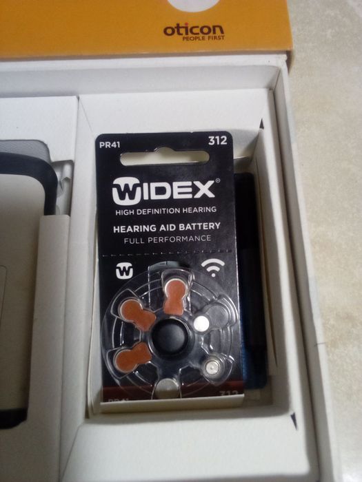 Продам новий слуховой апарат Oticon.Отдам на 50%дешевле риночной цени.