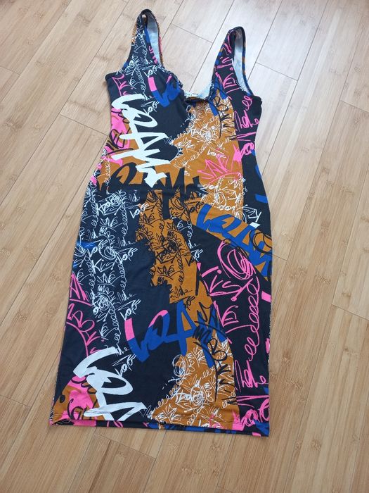 Dopasowana kobieca sukienka rozm 40- 42 USA